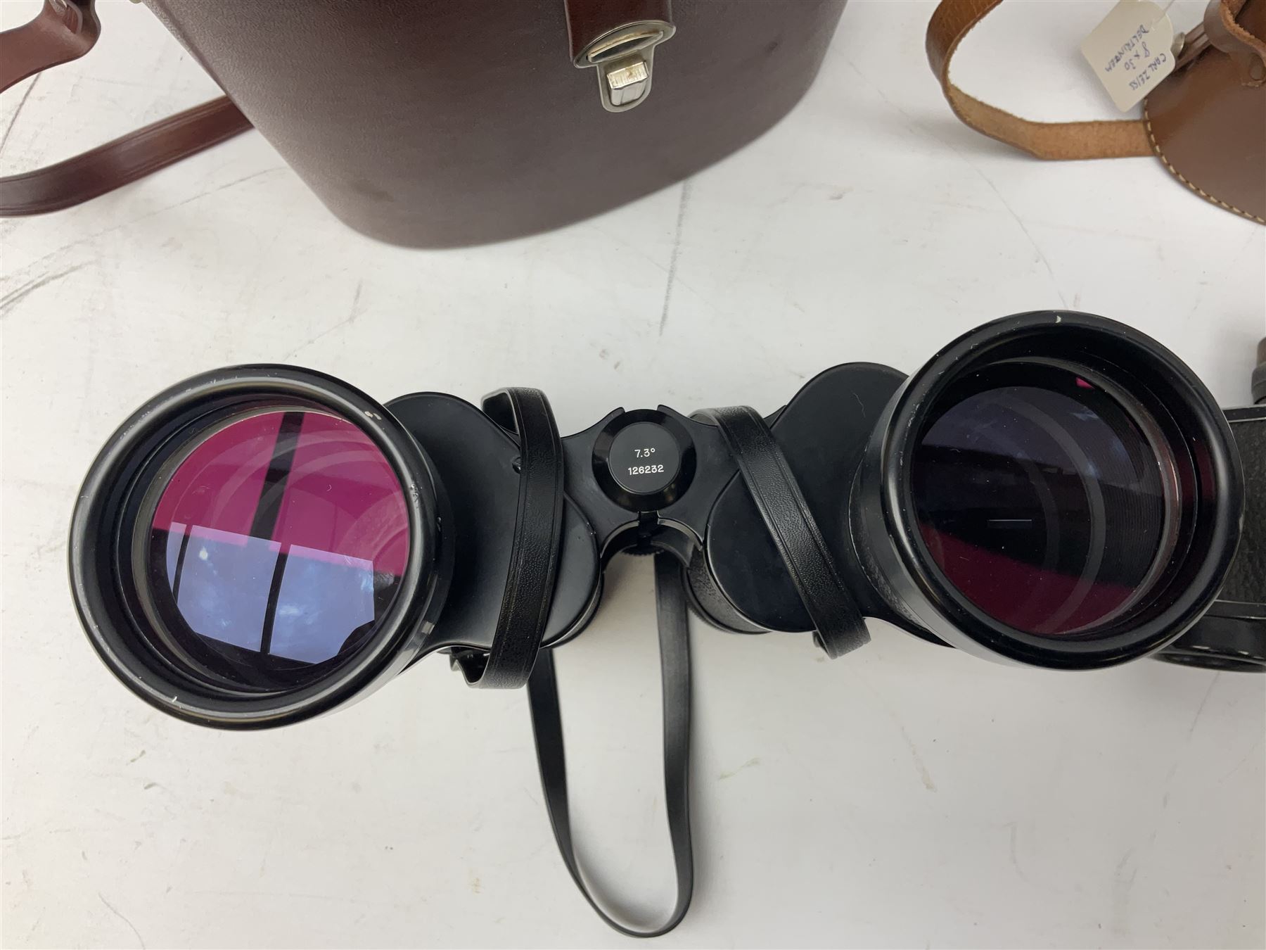 Three pairs of Carl Zeiss Jena binoculars, Jenoptem 10x50W, Jenoptem 8x30W and Deltrintem 8x30W, all cased (3)