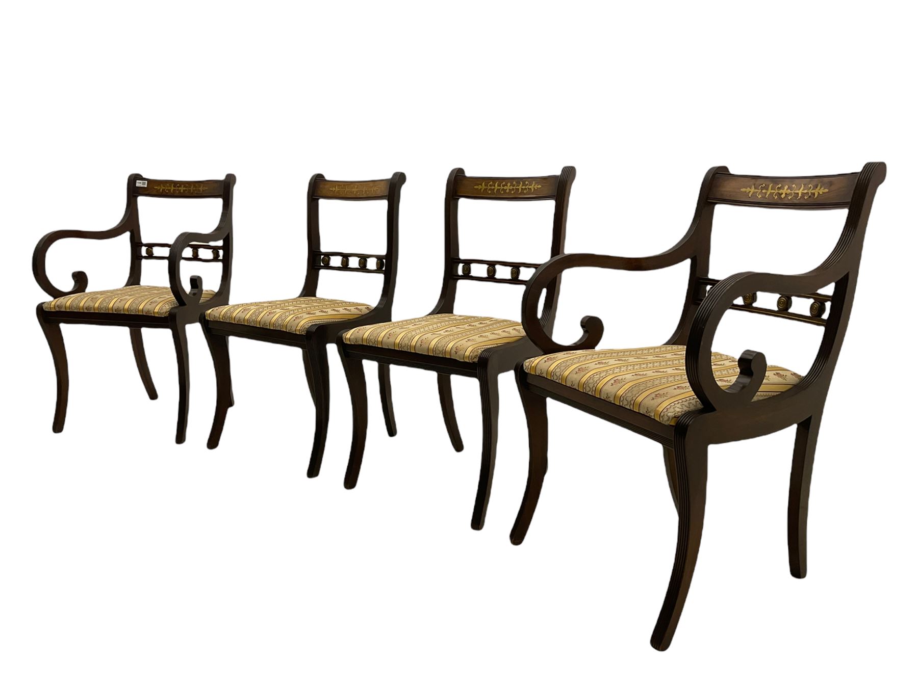 Set of eight Regency style mahogany dining chairs, brass inlay with gilded detail