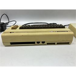 Commodore Vic 20 colour computer with power supply together with Commodore Datassette and Super Lander VIC 1907 game cassette