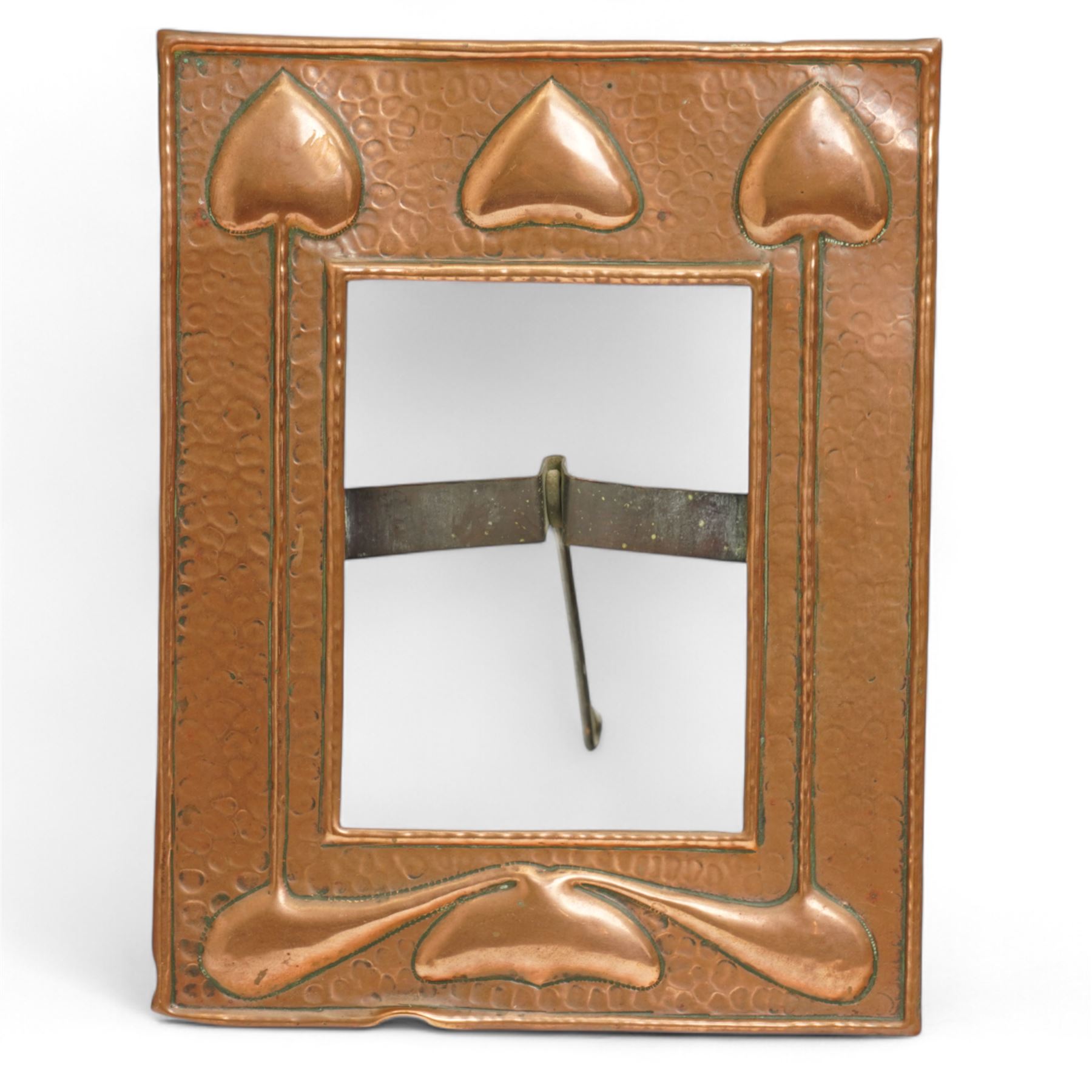 Newlyn type Arts and Crafts copper photograph frame decorated with a fish and galleon 24cm x 20cm with oval aperture and two other Newlyn style beaten copper frames (3)