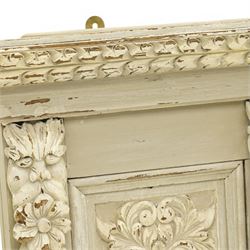 Victorian heavily carved oak wall mirror in distressed grey paint finish, moulded and chip carved cornice over central bevelled mirror and panelled front, the panels carved with urns and scrolled foliage, the uprights with fruiting foliage carved mounts 