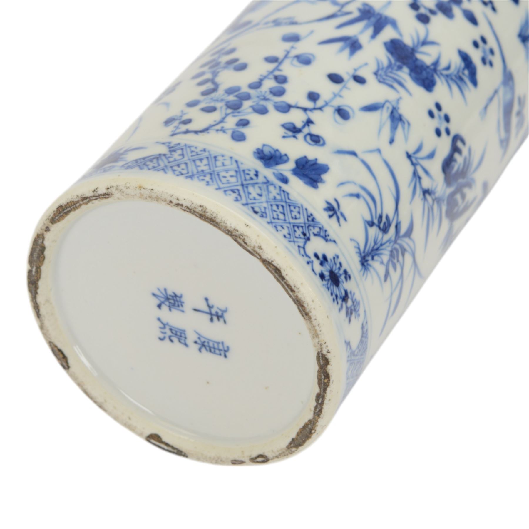 19th century Chinese blue and white sleeve vase, of cylindrical form with slightly flared neck, painted with birds and insects amidst blossoming flowers and foliage, the base and rim with trellis border interspersed with floral reserves, with four character Kangxi mark beneath, H35cm