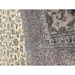 Kashan ivory ground rug, floral field, repeating brder