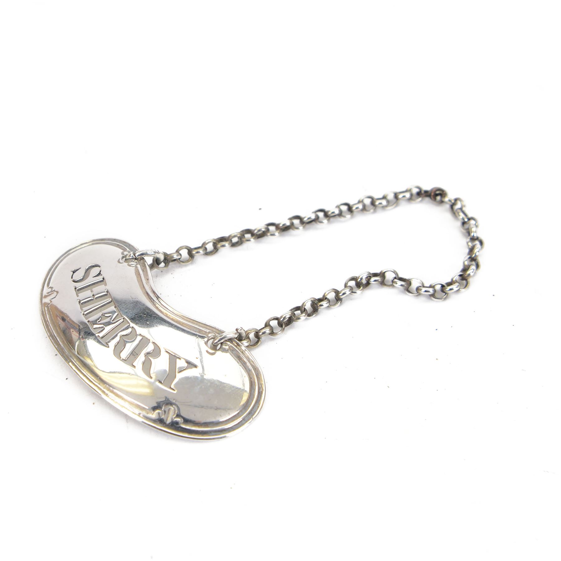 Georgian silver 'Sherry' decanter label, of curved form with pierced lettering, hallmarked Hester Bateman, no date mark