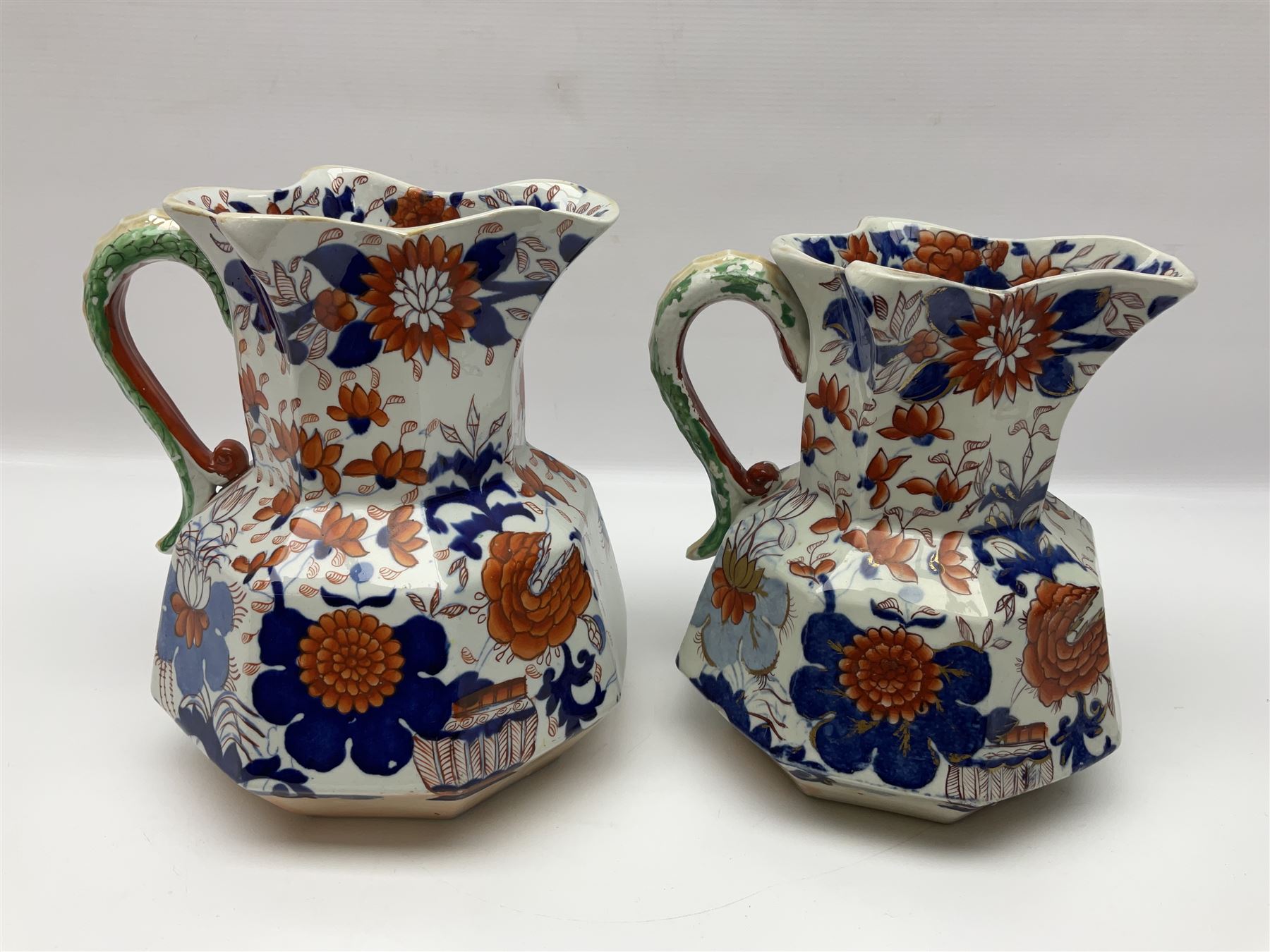 Two Masons Ironstone jugs, each in the Imari palette with serpent handles, with maker's mark beneath, tallest H24cm