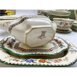 Extensive collection of Copeland Spode dinner and tea wares, decorated in the Chinese Rose pattern, comprising rounded oblong meat plate, sixty plates in five graduated sizes, twenty-five soup plates, five vegetable tureens with four lids, sauce tureen with lid and stand, two twin handles soup bowls (one with stand), sauce boat and stand, nine breakfast cups and ten saucers, two sandwich plates, milk jug, two graduated bowls and three egg cups with four stands, (128)