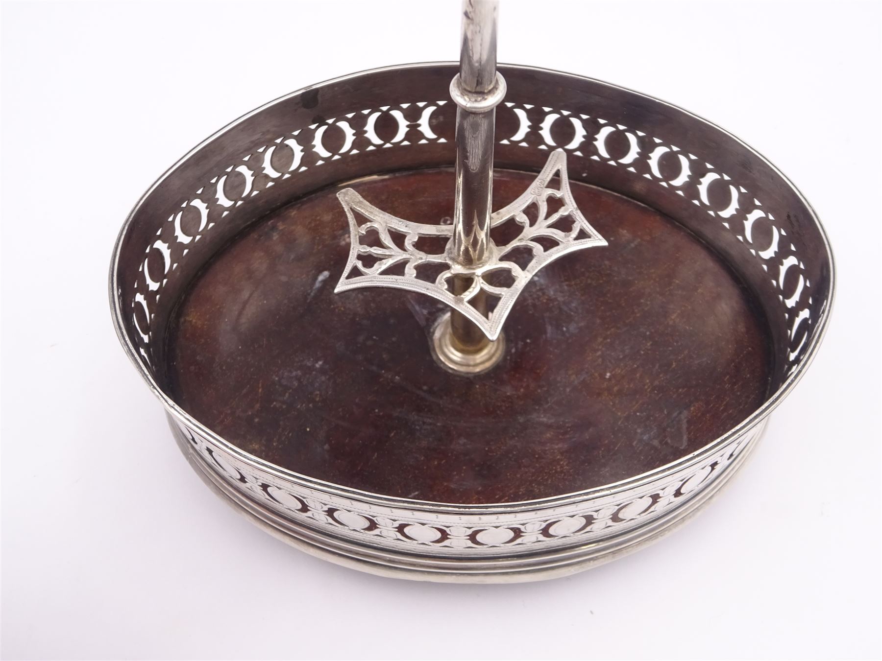 Late 18th century silver cruet stand, of oval form, with pierced sides upon four bun feet, hallmarked to handle Hester Bateman, all other hallmarks indistinct, together with five matched silver mounted cut glass cruet bottles, including some later Victorian examples, hallmarks predominantly indistinct, stand H20cm