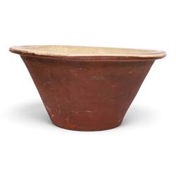 19th century pancheon, of tapering circular form, the glazed interior with slip decoration H20cm, D42cm 