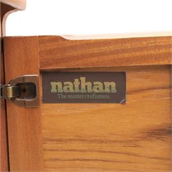 Nathan - teak corner cabinet, the upper section with moulded cornice and two fixed shaped open shelves, above a curved corner cupboard with twin signature square panelled doors, on a shaped plinth