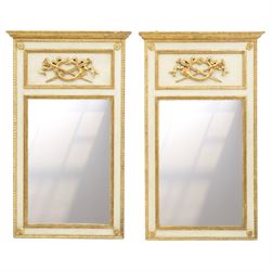 Neoclassical design pair of cream painted and gilt pier mirrors, projecting moulded cornic...