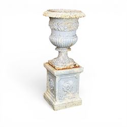 Victorian weathered heavy ornate cast iron garden centerpiece urn, distressed white and duck egg blue painted, raised on square plinth with rose detail 