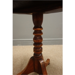  Early 19th century mahogany tripod table, circular moulded top, turned column, three splayed supports, turned bun feet, D36cm, H50cm  