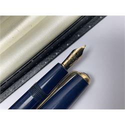 Three fountain pens, to include Conway Stewart 'Dinkie 550' and 'Conway 57' and a Parker 'Slimfold', all with 14ct gold nibs, together two roller ball pens, including a Parker example and a Swarovski Crystal paperweight