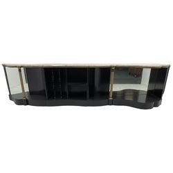 Italian ebonised and gilt serpentine corner console bookcase cabinet, shaped pink marble top over assorted shelves and dividers with fluted pilasters and mirror backs, on skirted base 