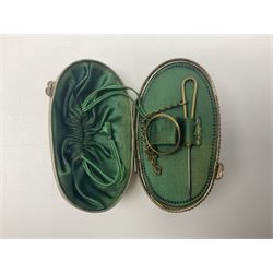 19th century lacquer thimble case with painted portrait of a woman to the hinged lid, together with two mother of pearl egg shaped thimble cases and one other