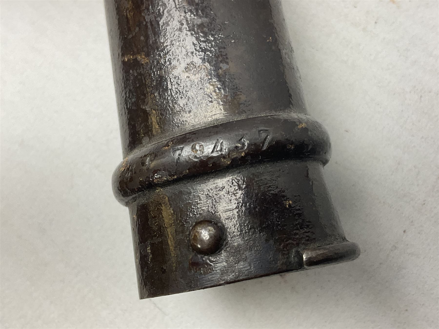 French Model 1866 Chassepot bayonet with 57cm curving fullered steel blade dated 1873 No.L63963; in steel scabbard with conforming number L71.5cm overall; and French St. Etienne Gras bayonet dated 1878 No.K10674 in steel scabbard numbered 79437 (2)