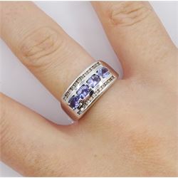 14ct white gold three row oval cut tanzanite and round brilliant cut diamond ring, stamped