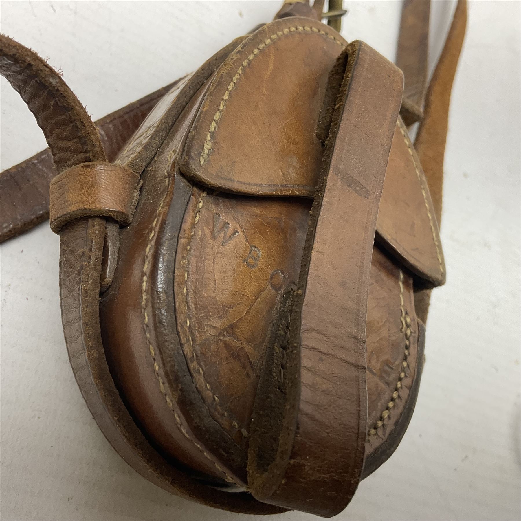 Broadhurst Clarkson brass and leather 4-draw telescope, the first draw with graduations, sliding lens shroud and leather covers for both ends on shoulder strap; marked 'Broadhurst Clarkson & Co. Ltd. 63 Farringdon Road London E.C.', L87cm fully extended; together with a WWI brass marching compass marked F-L No.123113 1918 (broad arrow); crudely etched L.H. McD. Latham; in associated Brooks & Co. leather case dated 1913 stamped W.B. Constable (2)