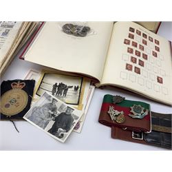 Great British and World stamps in two albums including a small number of Queen Victoria penny red stamps, small number of coins and various items of militaria interest