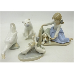  Lladro figure 'Dogs Best Friend' no. 5688, Lladro Polar Bear and Nao Goose and another Nao group (4)  