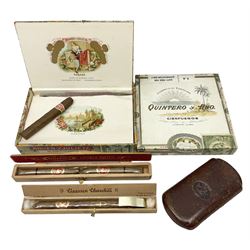 Victorian leather cigar protector with metal match striking plate on the end, and quantity of boxed cigars, comprising Willem II Churchill cigar, Willem II double dutch, Quintero Y Hno Habana cigars and Romeo Y Julieta, habana