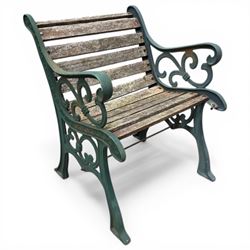 Pair of cast iron and wooden slatted chairs