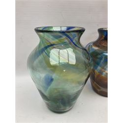 Three Hartley Wood coloured glass vases, each of baluster form with swirling decoration, tallest H21cm