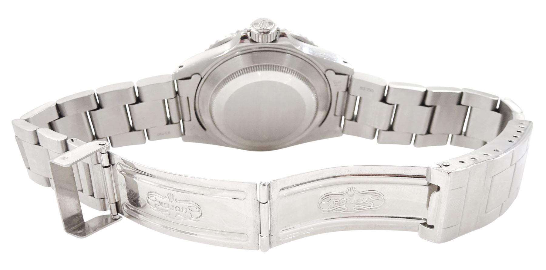 Rolex Oyster Perpetual Submariner Date stainless steel  automatic wristwatch, Ref. 16610, Serial No. L438272, black dial with luminous filled dot hour markers, baton quarters, white outer minute divisions, magnified date aperture at 3, polished Mercedes hands with luminous inserts, on Oyster stainless steel bracelet, with fold-over clasp