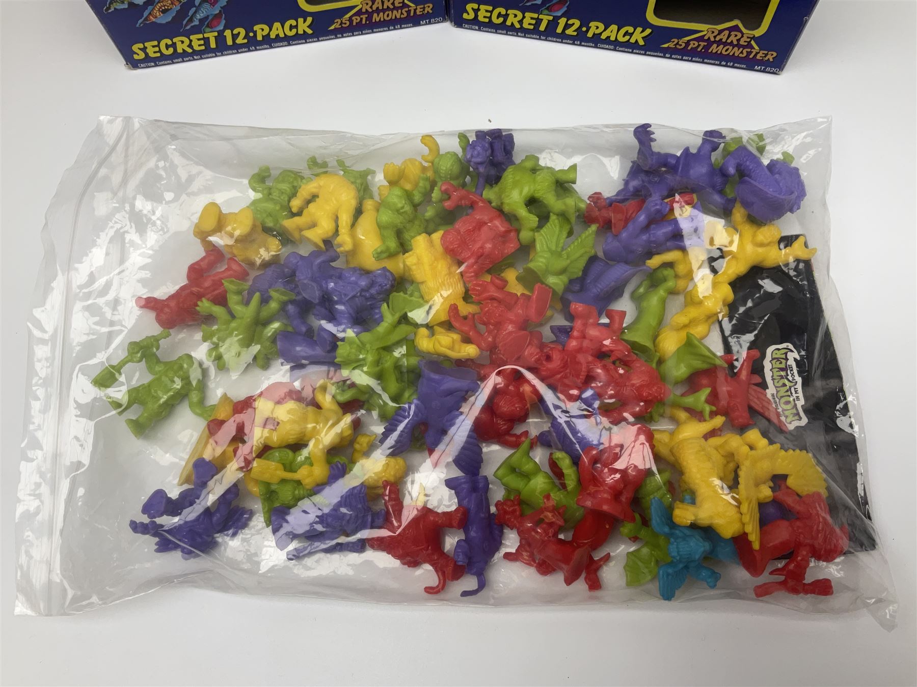 1990s Matchbox Monster in my Pocket - over seventy figures including full set of forty-three; and three empty Secret 12-Pack boxes