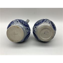 Pair of late 19th Century German Simon Peter Gerz salt glaze stone jugs, impressed mark to base, model number 550, H15cm