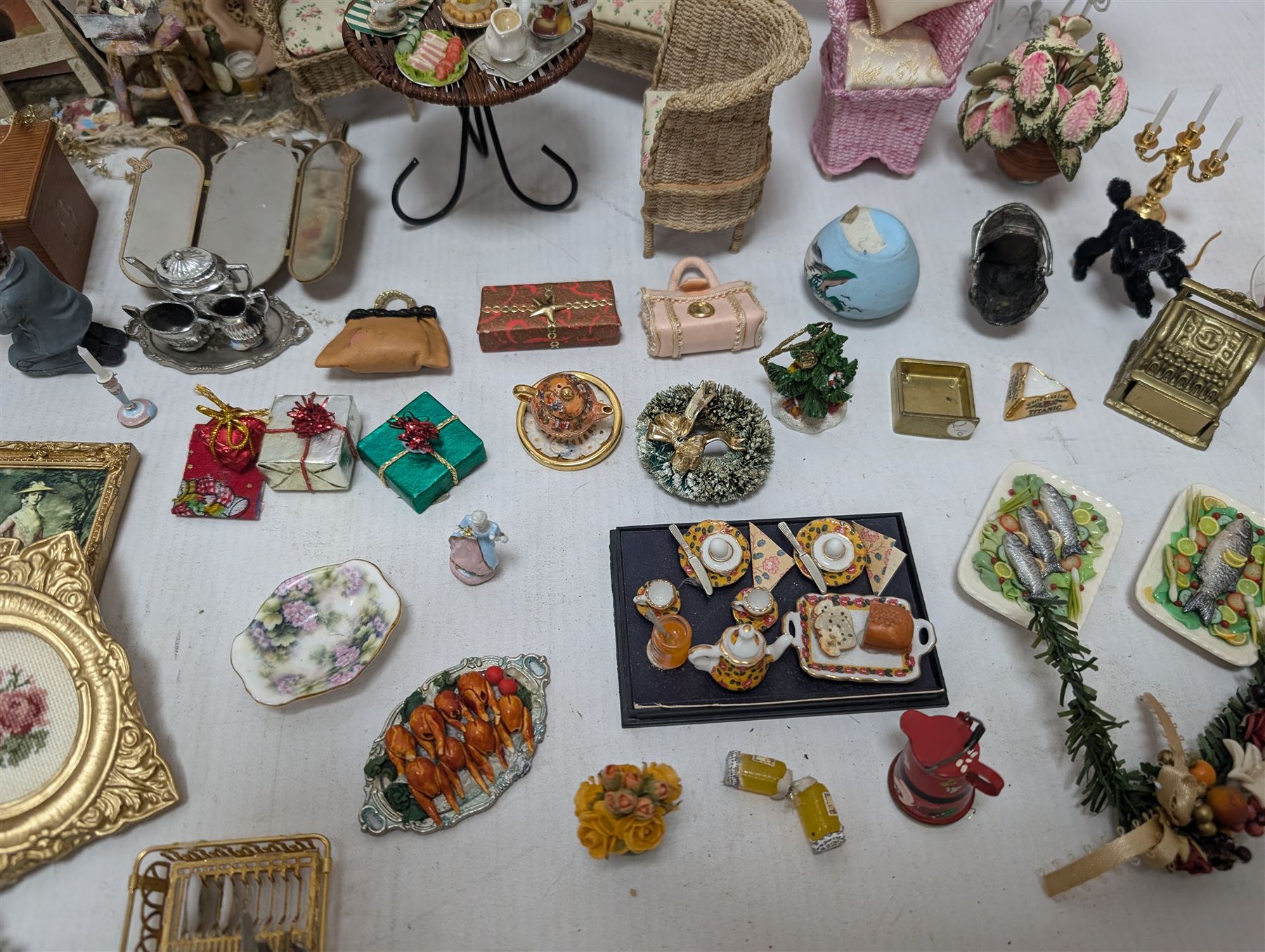 Dolls house conservatory and garden accessories, including sofa and chairs, trees, plants, paintings, Christmas decorations, etc 