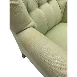 Buttoned back armchair, on turned front supports 