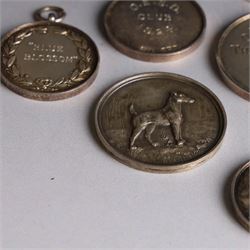 Seven 1920s Old English Sheepdog silver medals, all hallmarked, together with two further silver plated dog related medals
