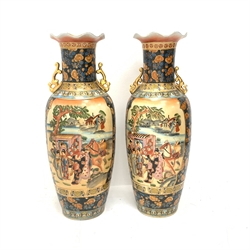 A pair of Chinese floor vases, of baluster form with frilled rim and twin gilt handles, decorated with figural scenes contained within foliate bands and stylised borders, H90cm. 