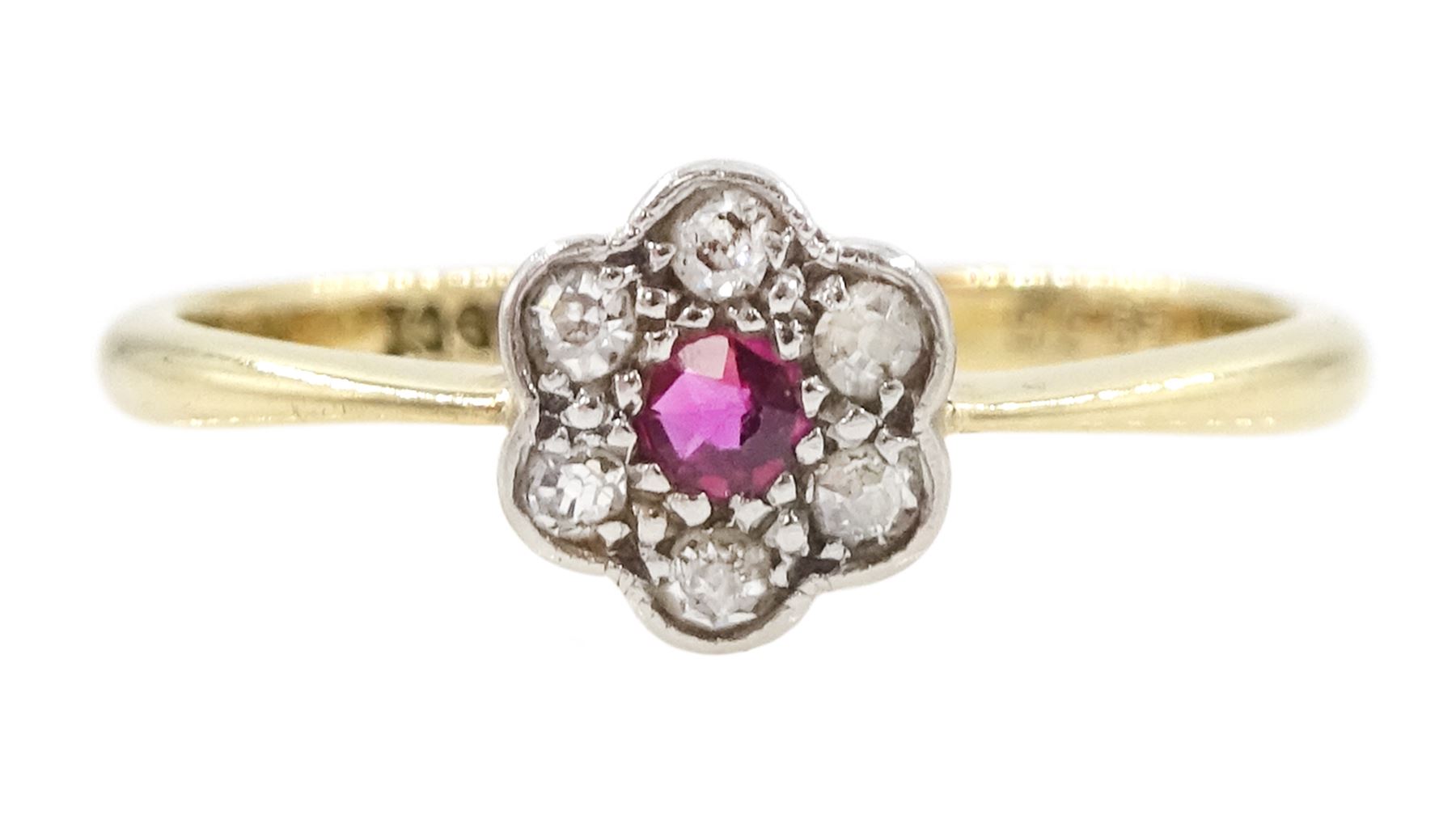 Early 20th century gold ruby and old cut diamond flower head cluster ring, stamped 18ct