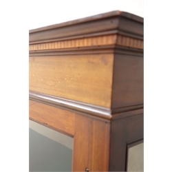  Edwardian inlaid mahogany display cabinet, projecting cornice, two astragal glazed doors enclosing three shelves, square tapering supports on spade feet, W106cm, H172cm, D37cm  