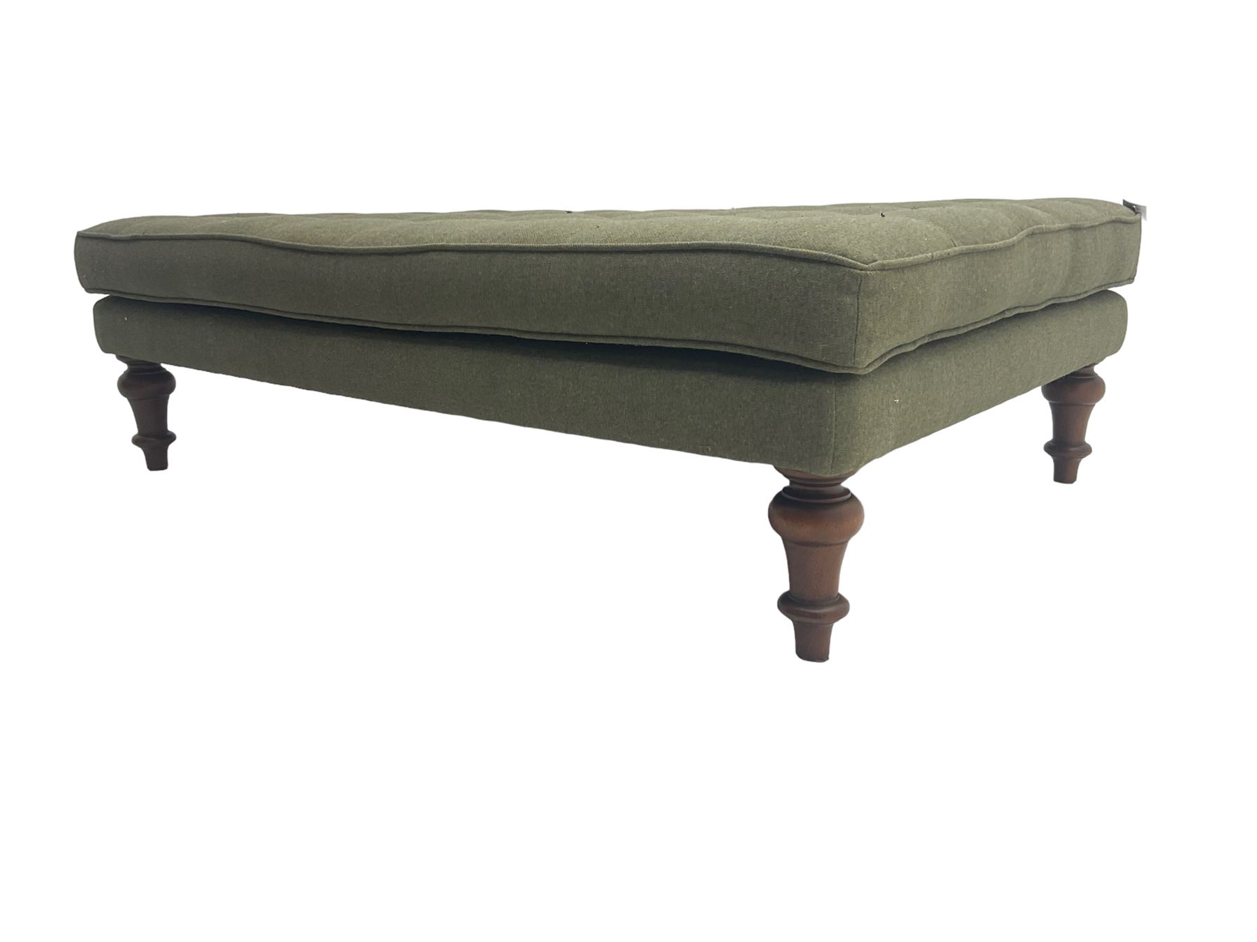 Peter Silk of Helmsley - large rectangular footstool upholstered in buttoned green tweed fabric, on turned mahogany feet