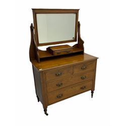 Edwardian oak dressing chest, bevelled swing mirror, two short and two long drawers
