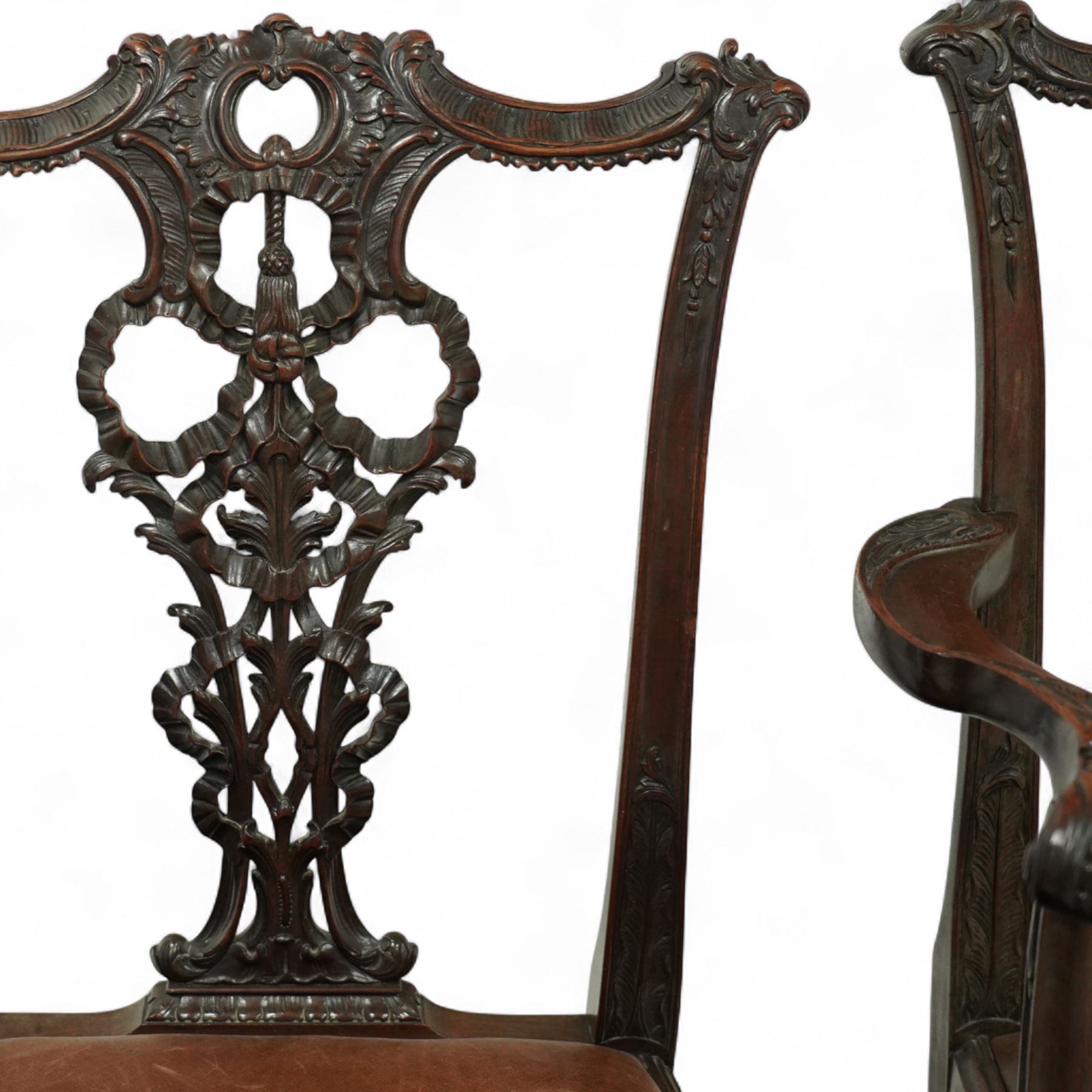 Set of eight 20th century Chippendale design mahogany dining chairs, including two carvers, each with pierced ribbon back splat carved with acanthus leaves, drop-in leather upholstered seats, moulded seat rails, on cabriole legs with ball and claw feet