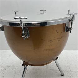 Timpani drum with coppered finish to the bowl, marked 'BS 3499' underneath, three adjustable tubular legs and Premier head D67cm