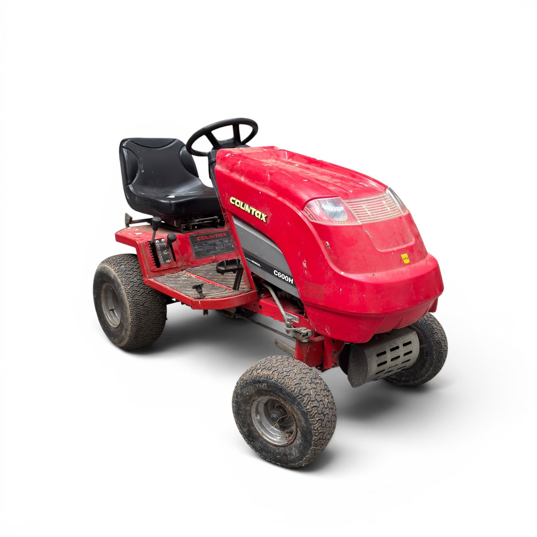 Countax C600H - ride on lawnmower / yard tractor with Honda engine, black seat and red bodywork.