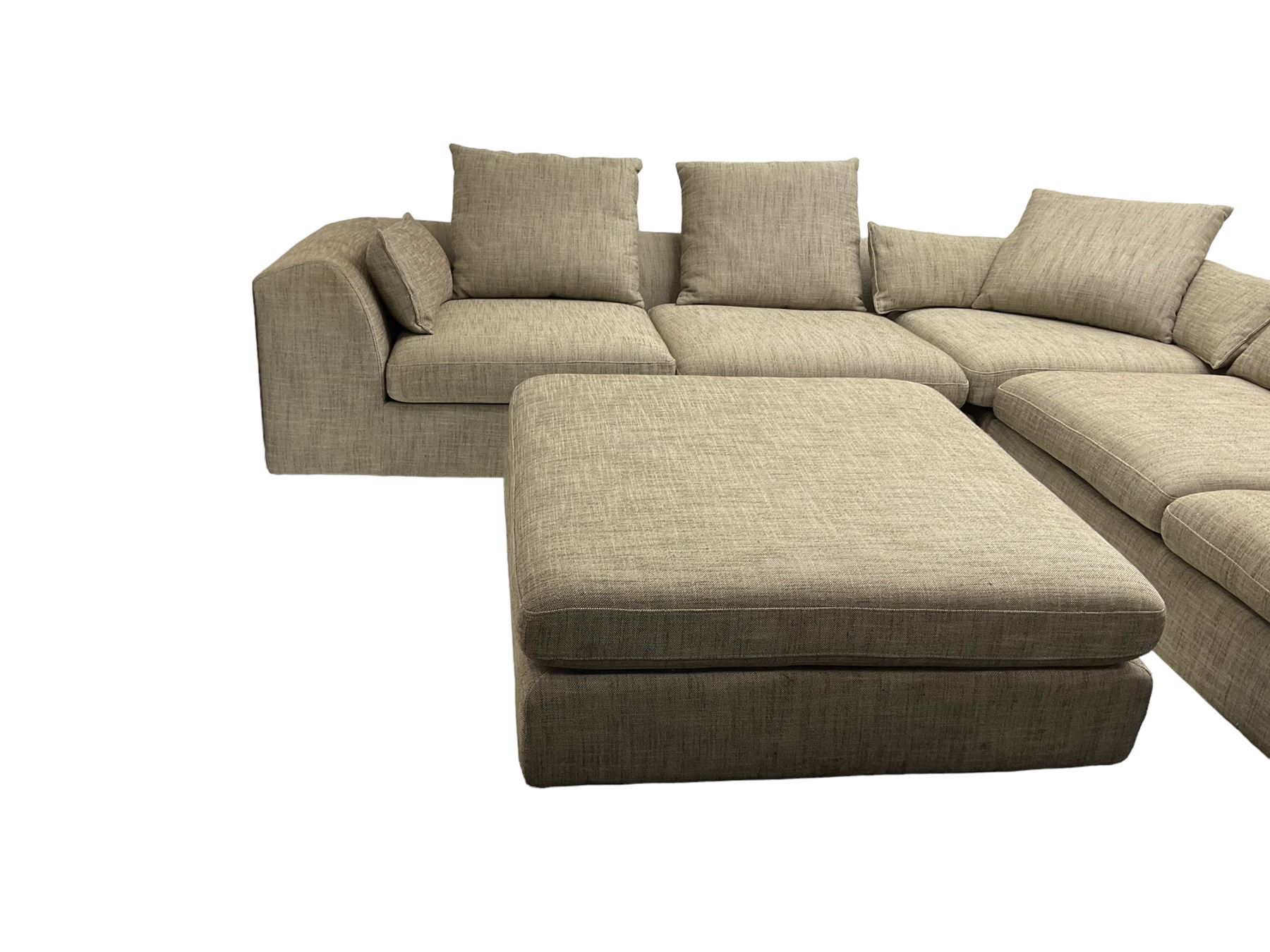 Contemporary corner sofa upholstered in grey fabric (310cm x 282cm); with matching rectangular footstool (110cm x 110cm)