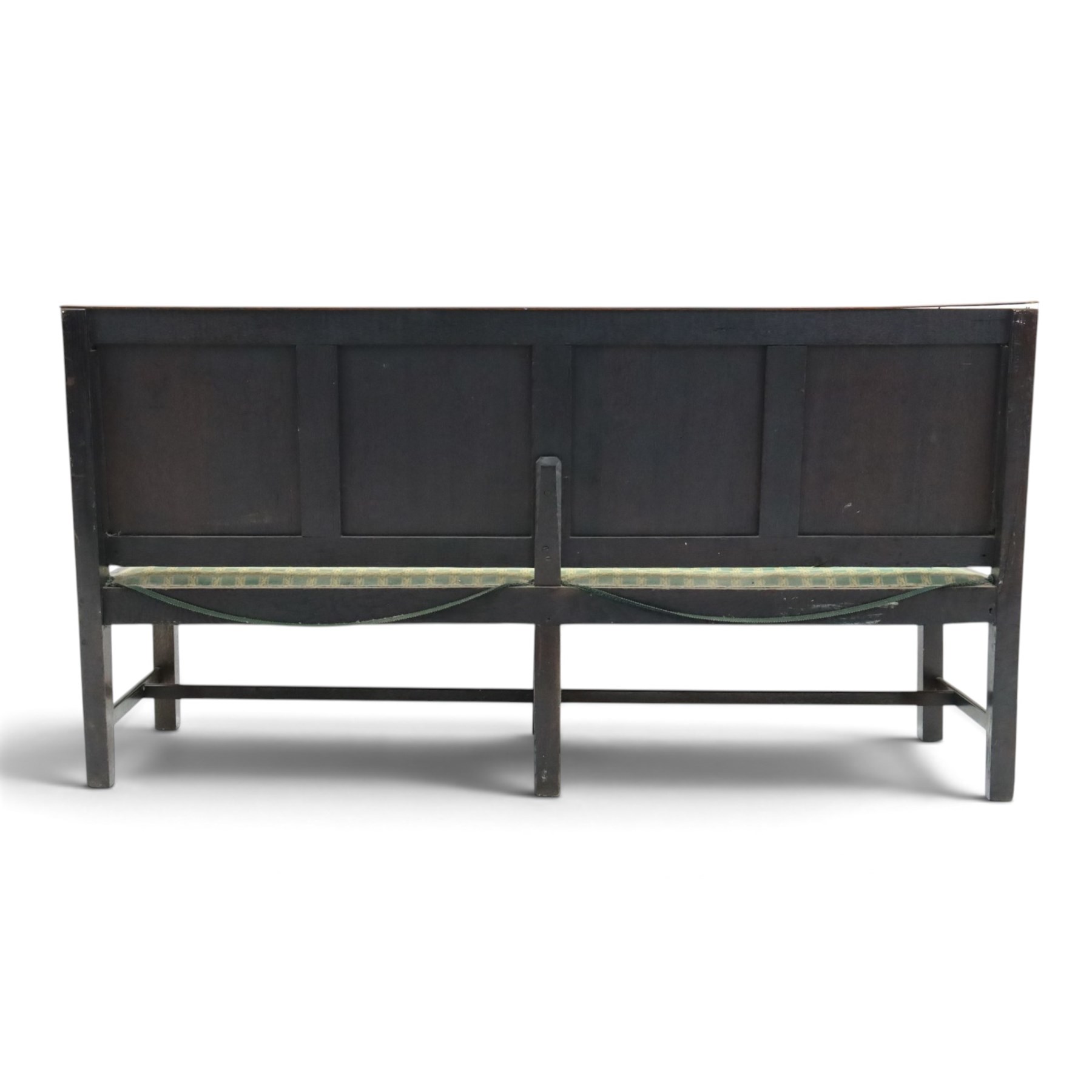 17th century design oak four panelled hall bench, fielded back panels flanked by swept arms on turned supports, raised on six supports united by a stretcher