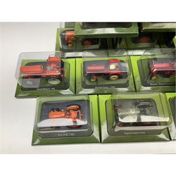 Eighteen issues of Tractors and The World of Farming magazine, together with sixty diecast tractors, all in original packaging, in three boxes 