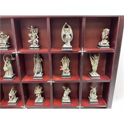 Danbury Mint 'The Fantasy of the Crystal' chess set consisting of mythical pewter chess pieces within a wooden case with chess board lid, together with 16 additional chess pieces in a wooden display case.