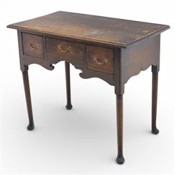 Georgian oak lowboy, the rectangular top with moulded edge over three fitted drawers and shaped apron, raised upon slender cabriole legs, with pad feet