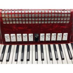 Clinkscale Crucianelli piano accordion in red pearline case with one-hundred and twenty buttons and forty-one keys L52cm; in carrying case
