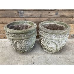 Pair of cast stone ornate circular planters