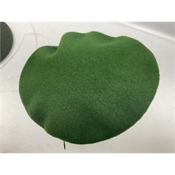 Four paratrooper berets - Russian, Italian, British and Foreign Legion; all with badges (4)