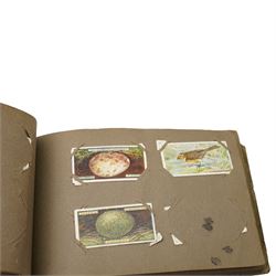 Two cigarette card albums and contents of various cards